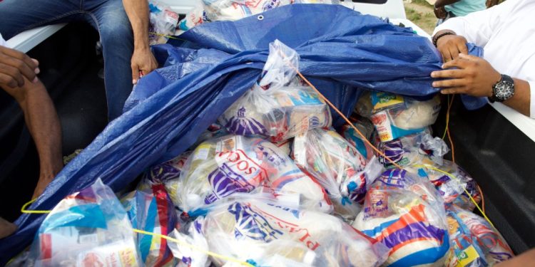 Gobierno lleva ayuda a sectores afectados en SDN por disturbio tropical